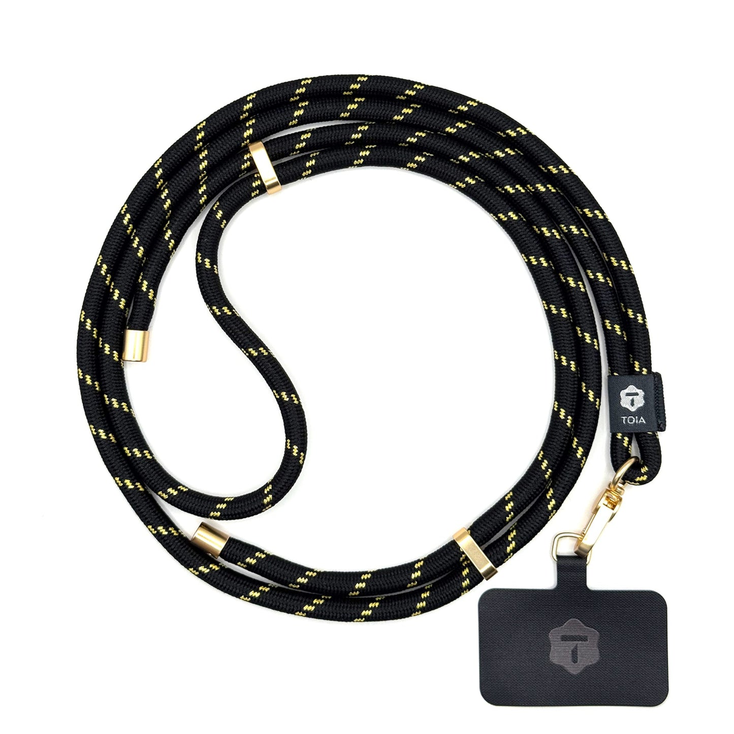 Modern black and gold striped crossbody phone lanyard with gold metal hardware by TOIA.