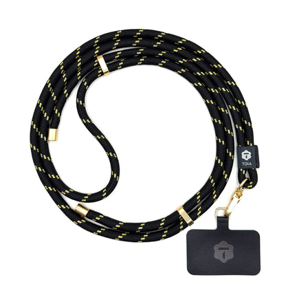 Modern black and gold striped crossbody phone lanyard with gold metal hardware by TOIA.
