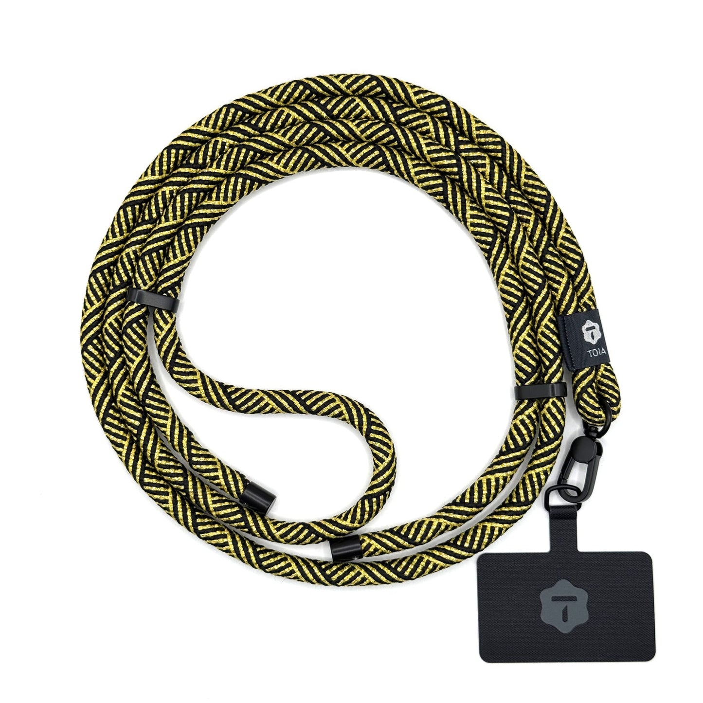 Modern black and gold herringbone crossbody phone lanyard with matte black metal hardware by TOIA.