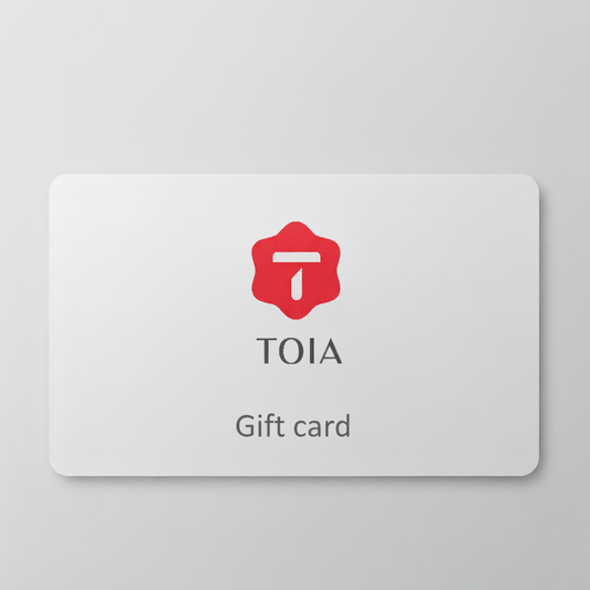 TOIA gift card with a red logo on a gray background