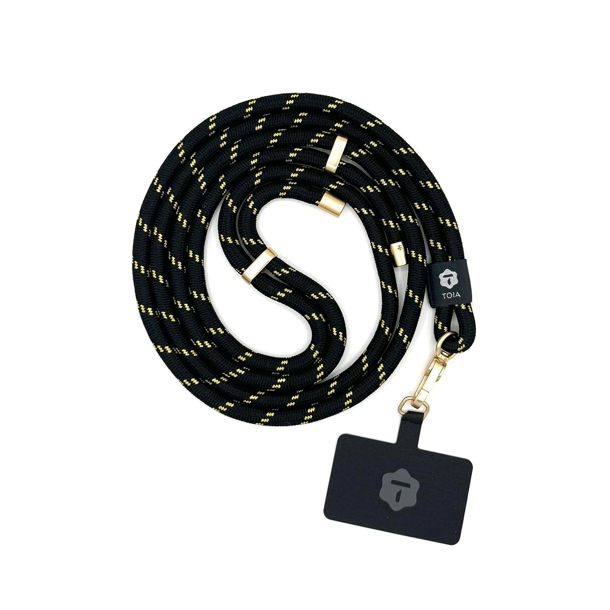 Black lanyard with gold accents and a black tether tab holder. 