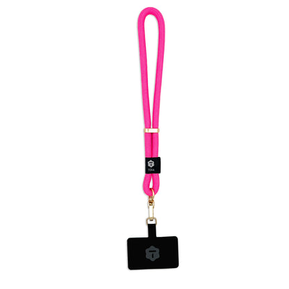 Modern and vibrant hot pink rope wrist phone strap with gold hardware by TOIA.