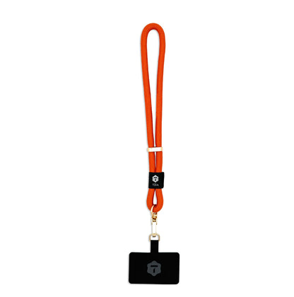 Modern sunset orange rope wrist phone strap with shiny gold clasp by TOIA.